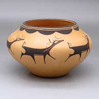 A polychrome jar decorated with a deer-with-heart-line and geometric design
 by Anderson Peynetsa of Zuni