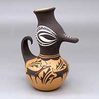 A polychrome duck pot decorated with a deer-with-heart-line, mountains, forest and geometric design
 by Anderson Peynetsa of Zuni