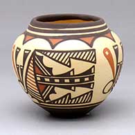 A small polychrome jar decorated with a three-panel deer-with-heart-line-in-his-house and geometric design
 by Carlos Laate of Zuni