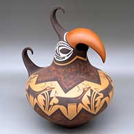 A polychrome quail pot decorated with a deer-with-heart-line and geometric design
 by Anderson Peynetsa of Zuni