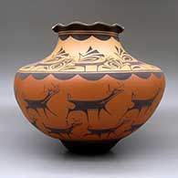 A large polychrome jar with a pie crust rim and decorated with a deer-with-heart-line and geometric design, click or tap to see a larger version