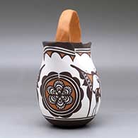 A polychrome wedding vase decorated with a deer-in-his-house, rosette and geometric design, click or tap to see a larger version