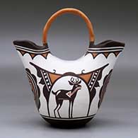 A polychrome wedding vase decorated with a deer-in-his-house, rosette and geometric design, click or tap to see a larger version