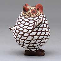 A polychrome standing owl figure, click or tap to see a larger version