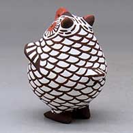 A polychrome standing owl figure, click or tap to see a larger version