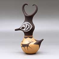 A small polychrome, feather-crested duck pot decorated with a deer-with-heart-line and geometric design, click or tap to see a larger version