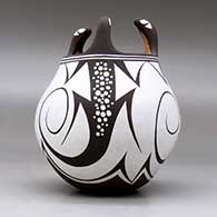 A polychrome jar decorated with three lizard head appliques and a lizard and geometric design, click or tap to see a larger version