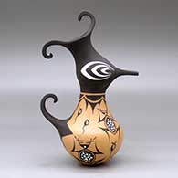 A polychrome crested duck pot decorated with a frog, tadpole and geometric design, click or tap to see a larger version