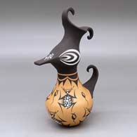 A polychrome crested duck pot decorated with a frog, tadpole and geometric design
 by Anderson Jamie Peynetsa of Zuni