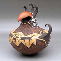 A crested parrot jar decorated with a deer with heart line and geometric design
 by Anderson Peynetsa of Zuni