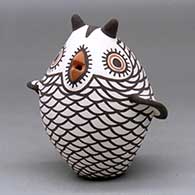 A polychrome owl figure
 by Carlos Laate of Zuni