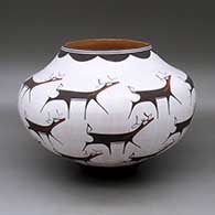 A polychrome jar decorated with a deer-with-heart-line and geometric design
 by Anderson Peynetsa of Zuni