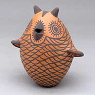 A black on red classic Zuni owl figure
 by Carlos Laate of Zuni