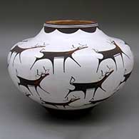 A polychrome jar decorated with a deer-with-heart-line and geometric design
 by Anderson Peynetsa of Zuni