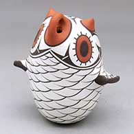 A polychrome owl figure decorated with a bird element design
 by Anderson Jamie Peynetsa of Zuni