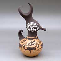 A polychrome duck pot decorated around the body with a deer with heart line, mountains, forest and geometric design
 by Anderson Peynetsa of Zuni