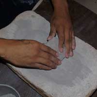 Grinding the clay yet finer