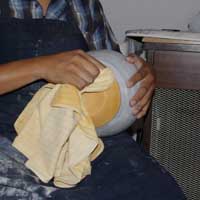 Buffing the ornage paint